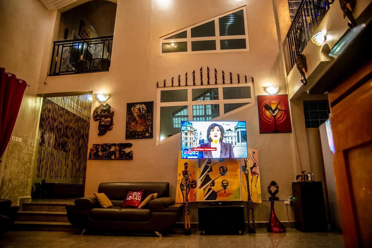 Homey Lodge คูมาซี ภายนอก รูปภาพ