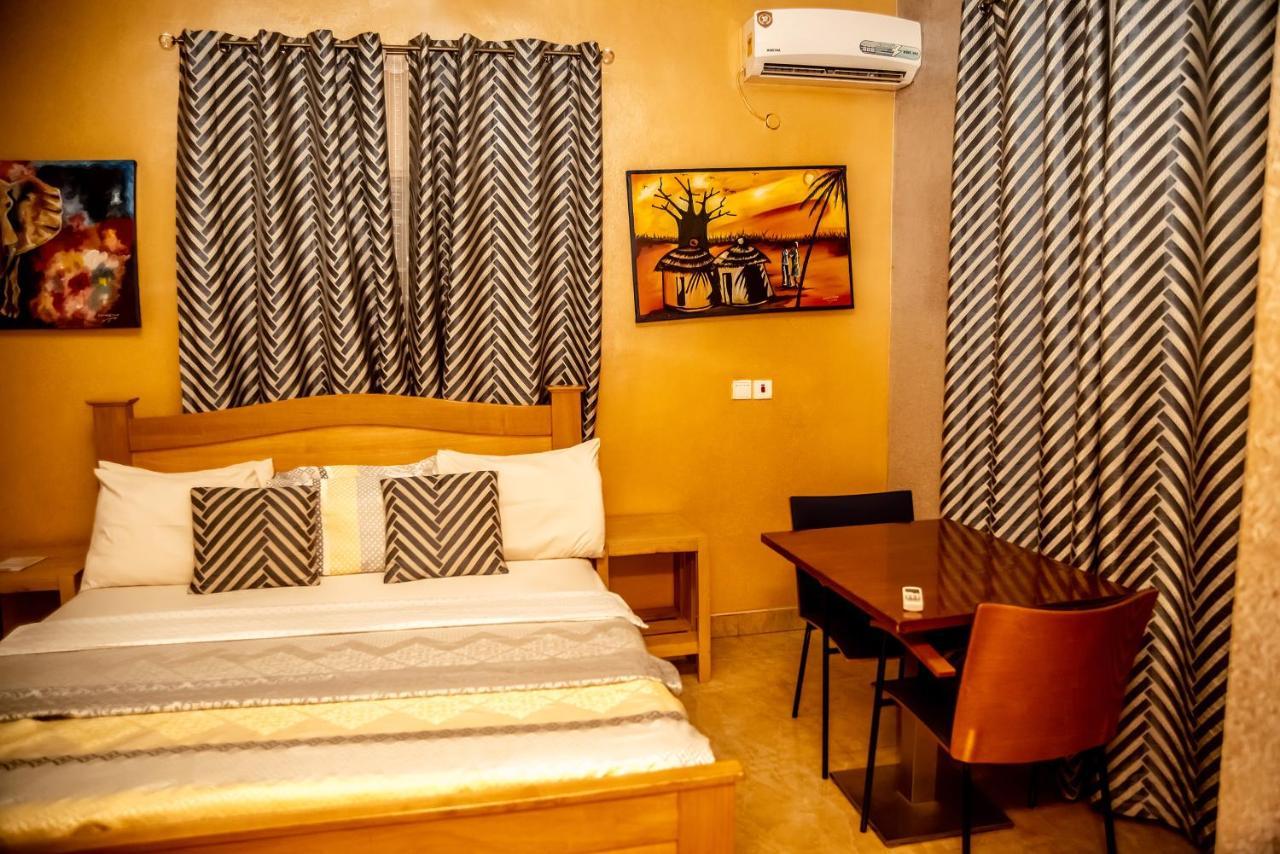 Homey Lodge คูมาซี ภายนอก รูปภาพ