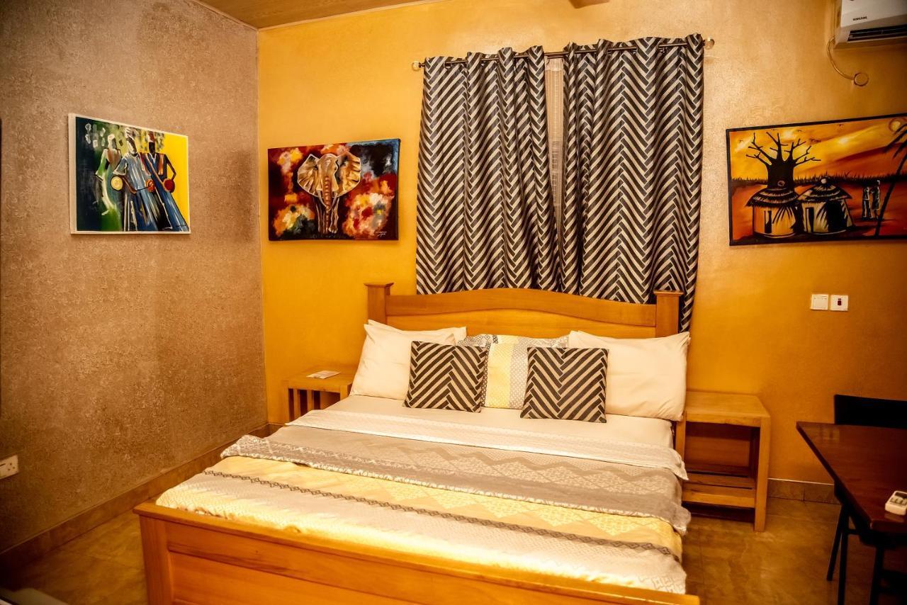 Homey Lodge คูมาซี ภายนอก รูปภาพ