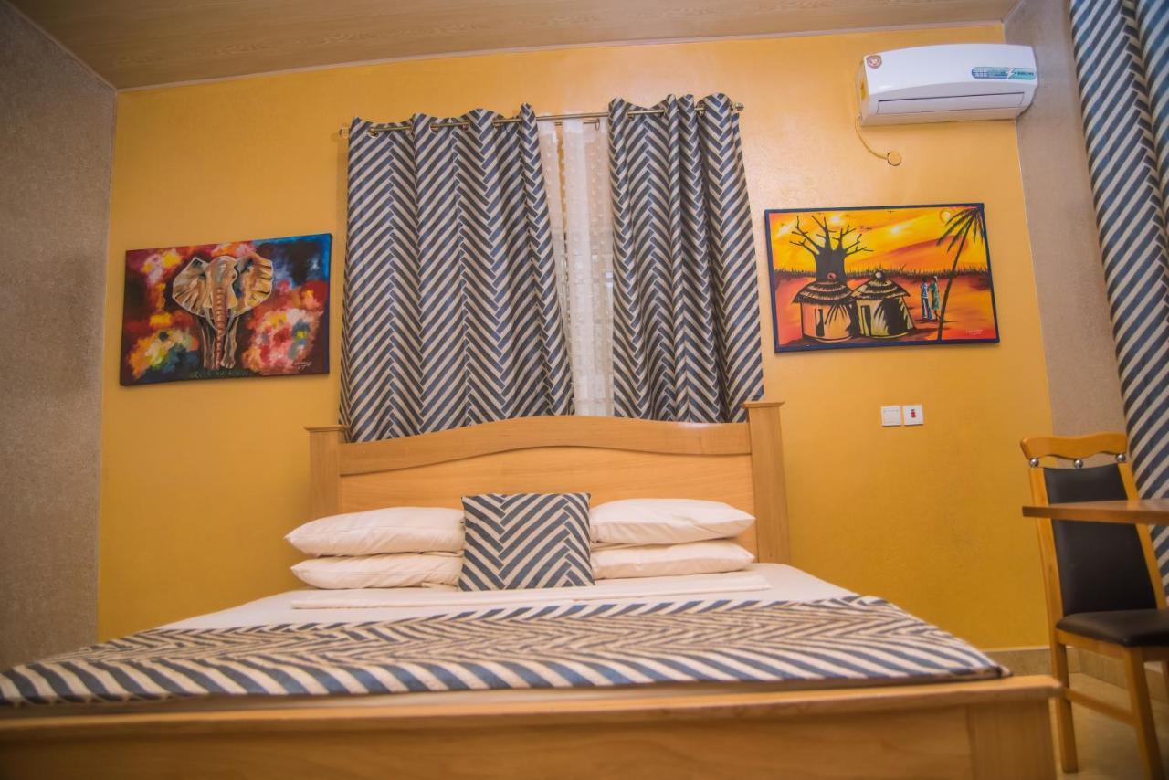 Homey Lodge คูมาซี ภายนอก รูปภาพ